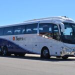 How to get to Kalbarri. TransWA road coach parked near the coast, offering scenic public transport options to Kalbarri